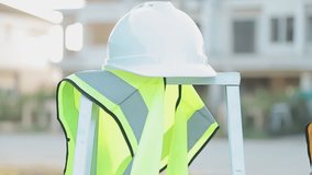 A team of construction engineers talks to managers and construction workers at the construction site. Quality inspection, work plan, home and industrial building design project - Powered by Shutterstock - Get 15% off with code: PIKWIZARD15