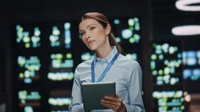 IT woman working tablet at datacenter closeup. Focused lady typing pad computer screen at server farm cloud computing facility. Server room specialist looking distance checking information on tab - Powered by Shutterstock - Get 15% off with code: PIKWIZARD15