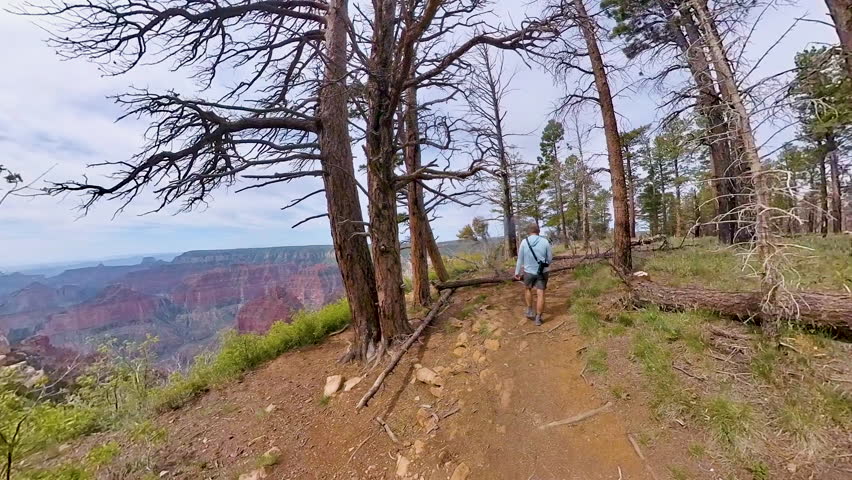 Man Hikes on the Ken Patrick on the North Rim of the Grand Canyon