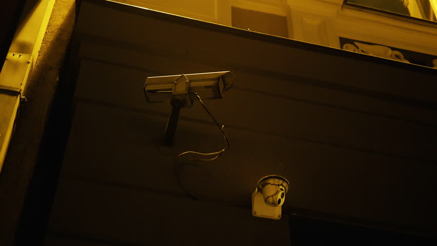 Watchful eye: Security camera at night Royalty-Free Stock Footage #3408218287