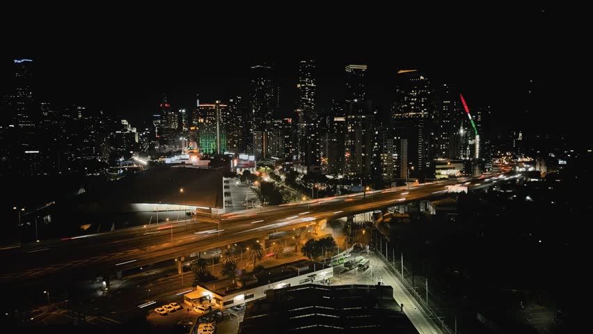 Melbourne Skyline Sparkles in the Night, Victoria, Australia. Big City at Night. Buildings. Skyscrapers. Timelapse