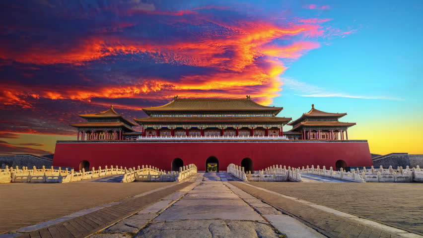 Ancient royal palace of the Forbidden City in Beijing, China. Historic ancient buildings at sunset. 4k time lapse video.