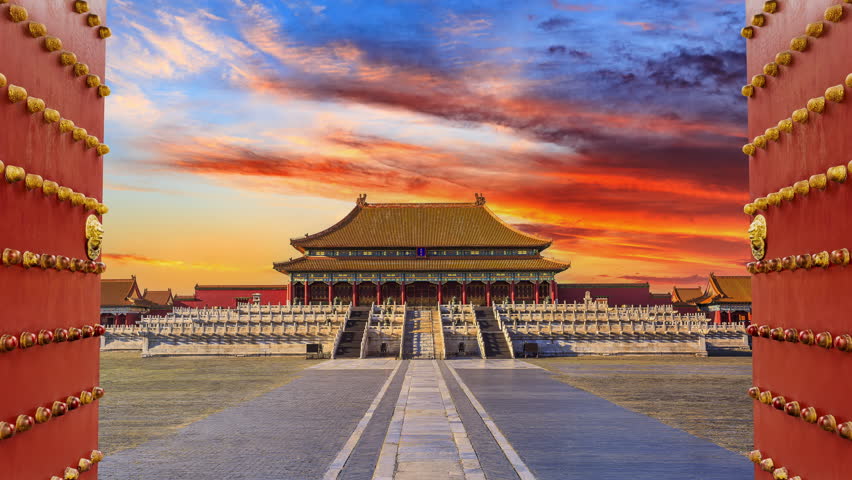 Ancient royal palace of the Forbidden City in Beijing, China. Historic ancient buildings at sunset. 4k time lapse video.