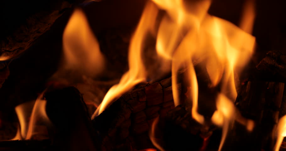 wood log fire. close-up of burning log. close-up of the flame of a wood stove. fire background in winter. wood fire in a fireplace Royalty-Free Stock Footage #3408522639