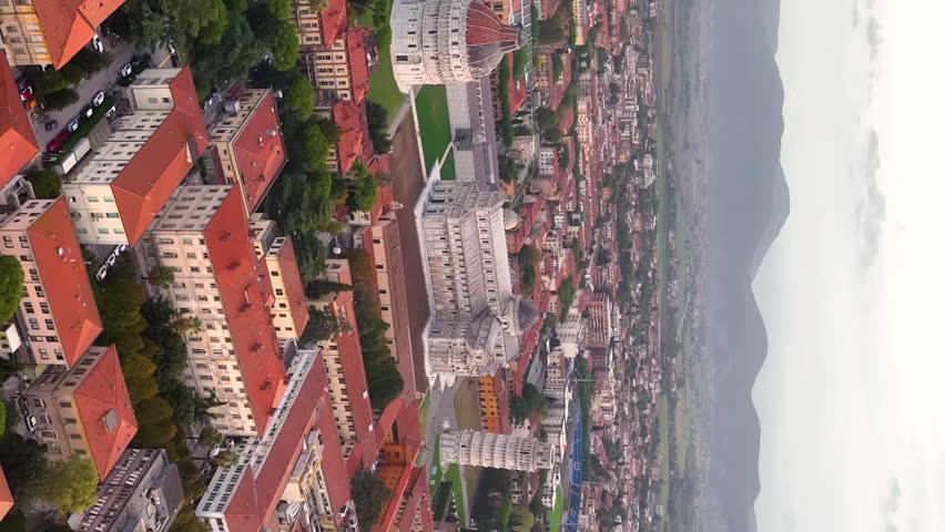 Pisa Cathedral and the Leaning Tower in Pisa, Italy. Cathedral with Leaning Tower of Pisa on Piazza dei Miracoli, Tuscany. vertical video