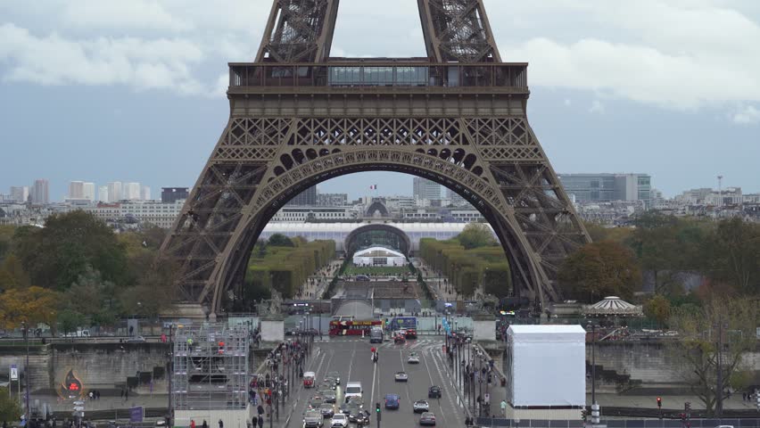 Eiffel Tower is an iron tower located in the Champ de Mars in Paris Royalty-Free Stock Footage #3408884787