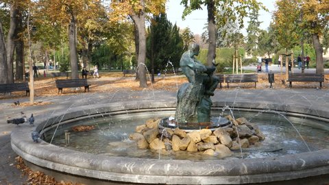Fountain The Struggle (Borba) or The man with the snake or Fisherman Fountain on Belgrade Kalemegdan Fortress. The bronze sculpture made by sculptor Simeon Roksandic. Belgrade 21 October 2017