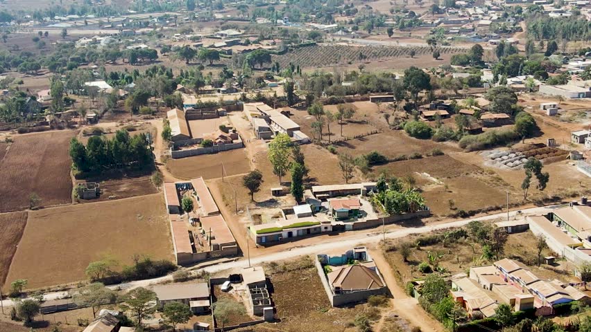 Aerial View of Nairobi, Kenya. Urban Neighborhood and Downtown in Skyline, 60fps Drone Shot