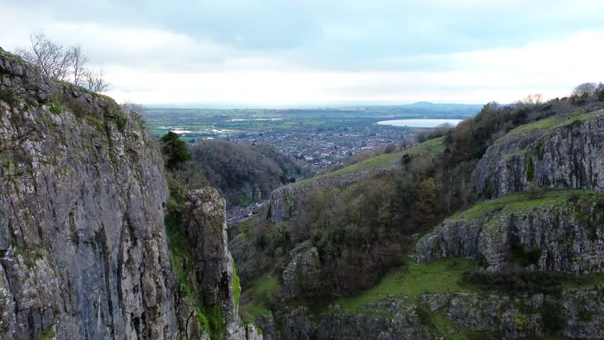 Rising shot of cheddar Gorge and reservoir