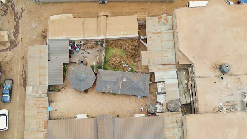 Aerial View of Nairobi, Kenya. Urban Neighborhood and Downtown in Skyline, 60fps Drone Shot