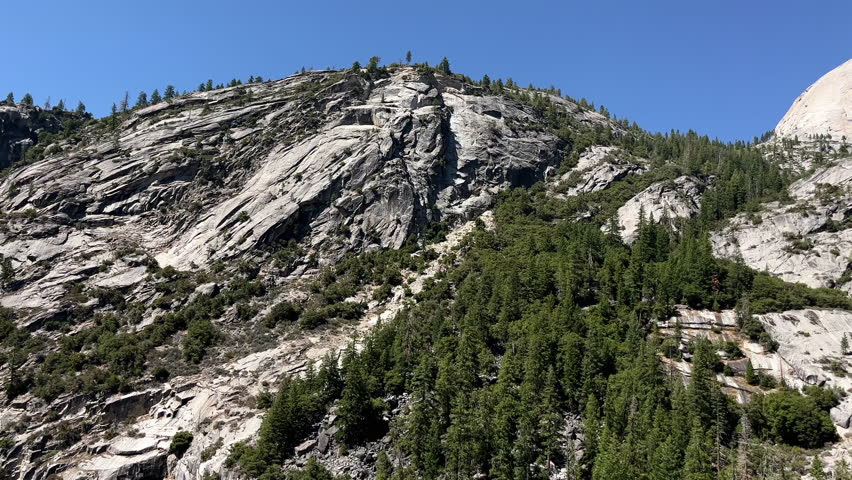 Rainbow In The Vernal Fall On A Sunny Day In Yosemite National Park, California. - tilt down shot