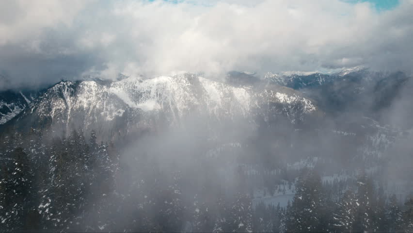 Drone Flight Through Fog Revealing Mountain Landscape Royalty-Free Stock Footage #3408949683