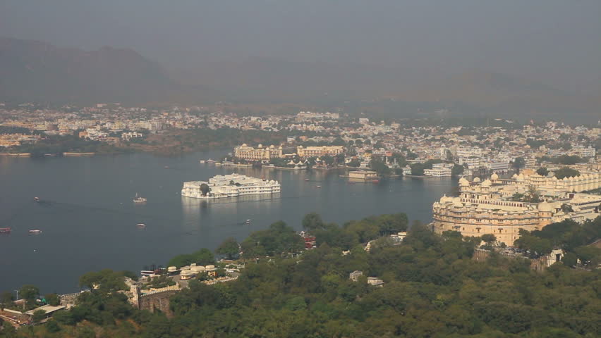 landscape with lake and palaces in Udaipur India - timelapse