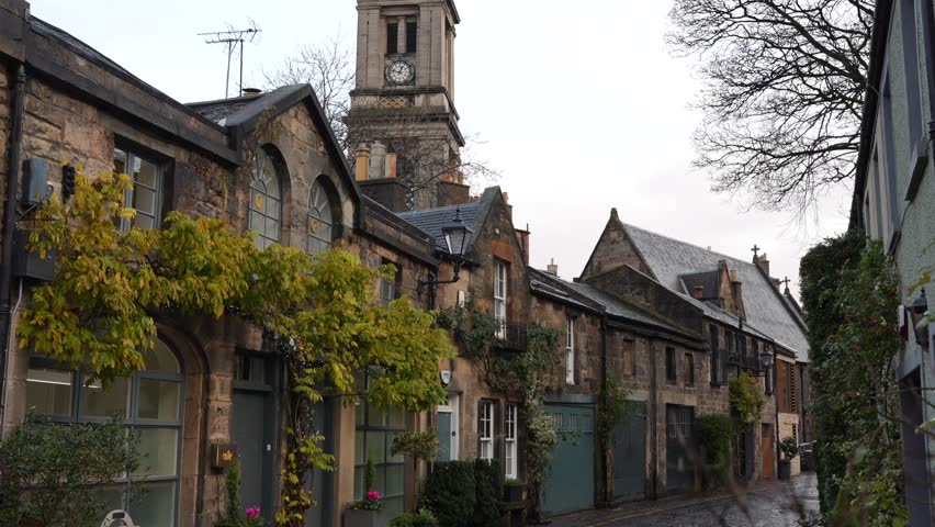 Quaint stone cottages on Circus Lane, Edinburgh. Moody rainy day in Scotland