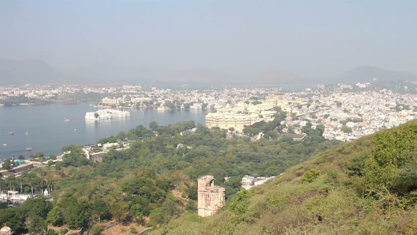 view from funicular on lake and palaces in Udaipur India - timelapse