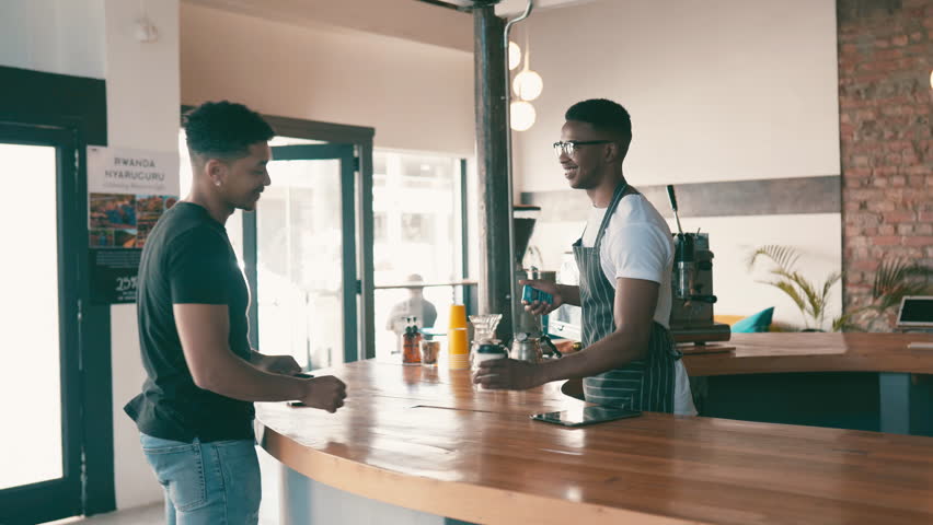 Cashier, customer and credit card at coffee shop POS, fintech and digital payment with cafe or business services. Barista or people at point of sale counter with machine, tap or scan for drink order