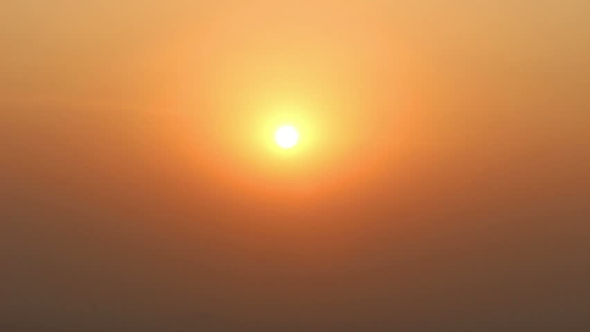 timelapse with sunset in fog