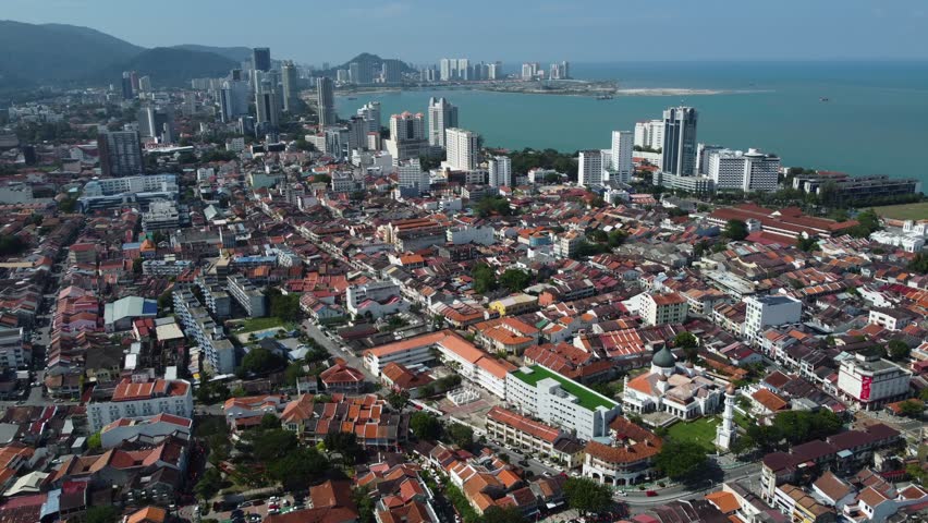 Aerial view of George Town, Penang, Malaysia. The iconic Kapitan Keling mosque is seen at the bottom right.