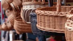 Woven baskets for sale, handmade crafts establishing shot - Powered by Shutterstock - Get 15% off with code: PIKWIZARD15