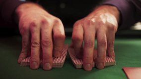 Close Up On Hands Of Professional Poker Dealer Doing A Riffle Shuffle Of Playing Cards Before High Stakes Game In Luxurious Casino. Anonymous Croupier Shuffling Deck Before Poker Tournament. - Powered by Shutterstock - Get 15% off with code: PIKWIZARD15