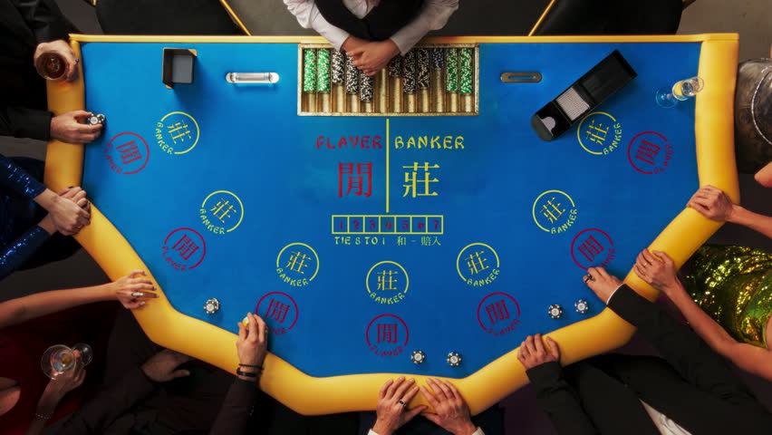 Top Down View Of Glamorous Casino Gamblers Placing Bets and Having Fun While Winning at Baccarat Table. Professional Croupier Dealing Cards, VIP People Enjoying Luxurious Lifestyle, Having Drinks.