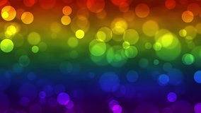 Colorful glowing bokeh particles animation.Colorful or raimbow  background.Moving bubbles colorful blurred animation backdrop.Rainbow flag, LGBT pride flag or gay pride flag. - Powered by Shutterstock - Get 15% off with code: PIKWIZARD15