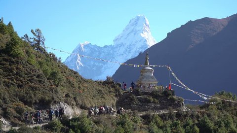 The Buddhist stupa on the hiking trail to the base camp of Everest. The concept of adventure and travel.
