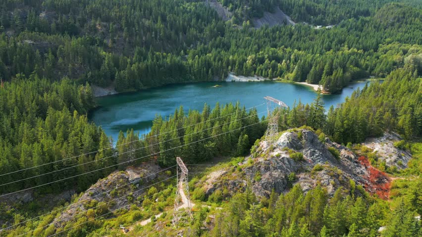 Aerial view on lake hidden somewhere in mountains near Whistler