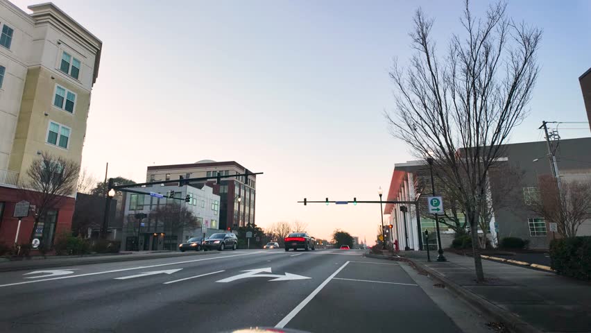 Hyper-lapse of cars going through a busy street in downtown Wilmington.