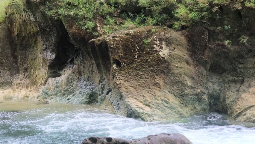 Beautiful river views with rocky banks, clear water flowing fast