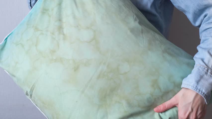  Dirty saliva stains or sweat stain on the pillow for long using Royalty-Free Stock Footage #3410137997