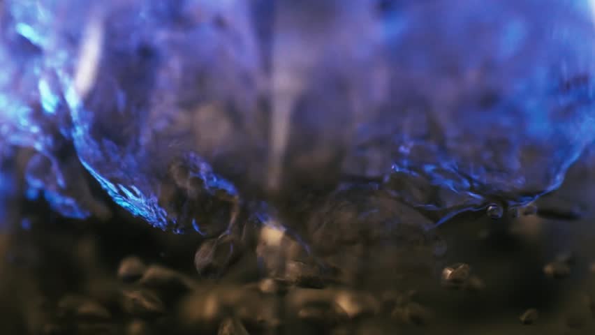 Boiling water in slow motion close-up