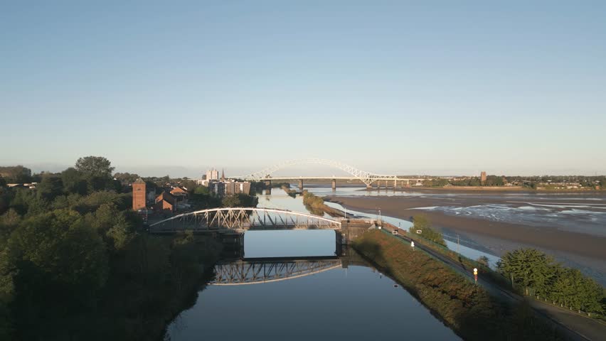 Manchester Ship Canal, Runcorn and Silver jubilee Bridge, Cheshire, England, slow approach
