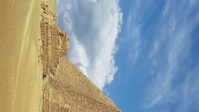 Timelapse with clouds over great pyramids at Giza Cairo in Egypt. Vertical video