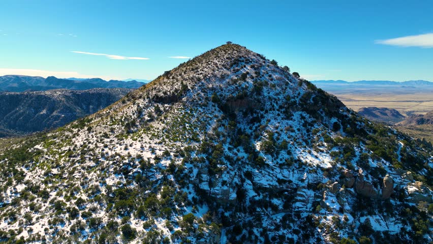 Sugarloaf Mountain aerial view with snow on the top in winter in Chiricahua National Monument in Cochise County in Arizona AZ, USA. 