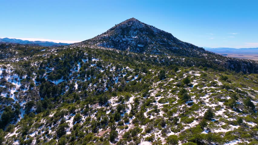 Sugarloaf Mountain aerial view with snow on the top in winter in Chiricahua National Monument in Cochise County in Arizona AZ, USA. 