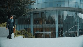 Dancing business man walking and hold bag while dancing and keep cool at park. Happy funny project manager moving body to music while going to work. Manager express feeling of overjoy. Exultant. - Powered by Shutterstock - Get 15% off with code: PIKWIZARD15