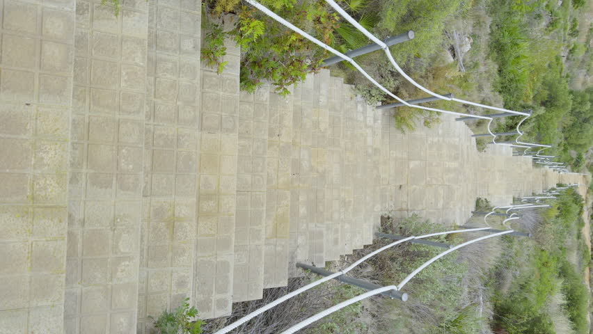 Province of Castellon. Rocks and turquoise sea with waves. Favorite place for active walks. VIA VERDE BENICASIM OROPESA. Oropesa del Mar