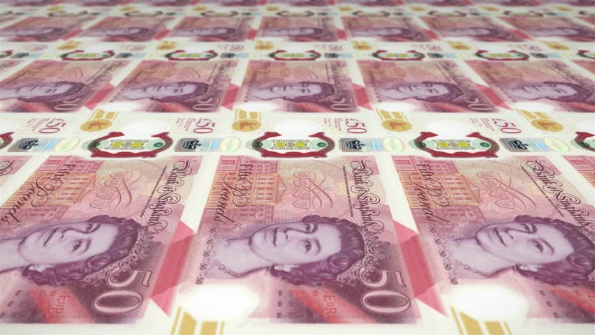 50 British pound sterling bills printing press. Money making machine prints banknotes. Close up of currency printing in action. Business, finance, inflation and deflation concept. Seamless loop