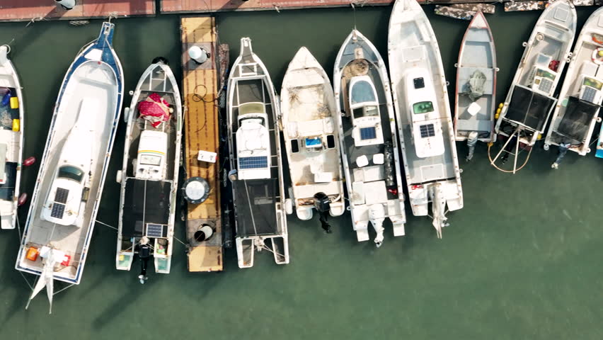 Aerial view of many fishing boats in fishing port
