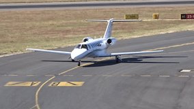 Generic White Private Jet Taxiing at Airport after Landing - Powered by Shutterstock - Get 15% off with code: PIKWIZARD15