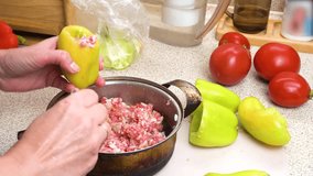 Preparing stuffed peppers. Stuffing peppers with minced meat. Step-by-step cooking video recipe. Culinary master class.
