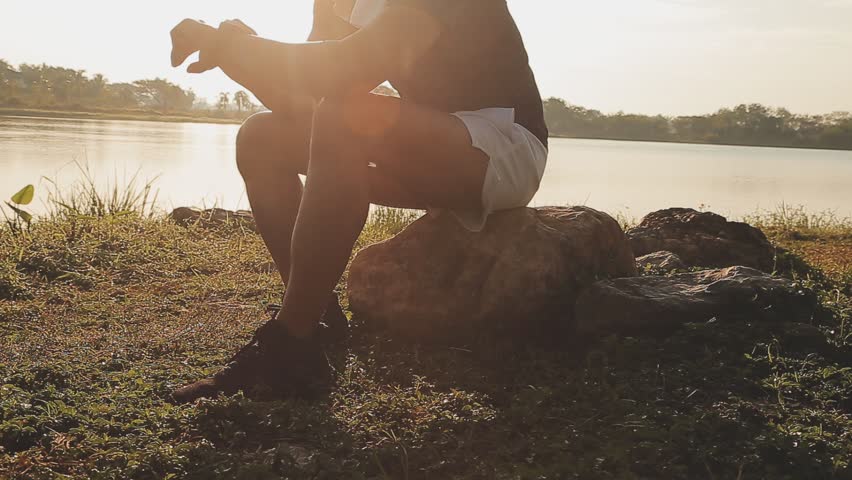 Athlete runner feet running on road, Jogging concept at outdoors. Man running for exercise..Athlete runner feet running on road, Jogging concept at outdoors. Man running for exercise.