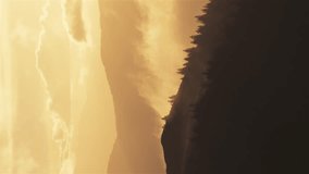 Mysterious mountains nature at golden sunrise Vertical video