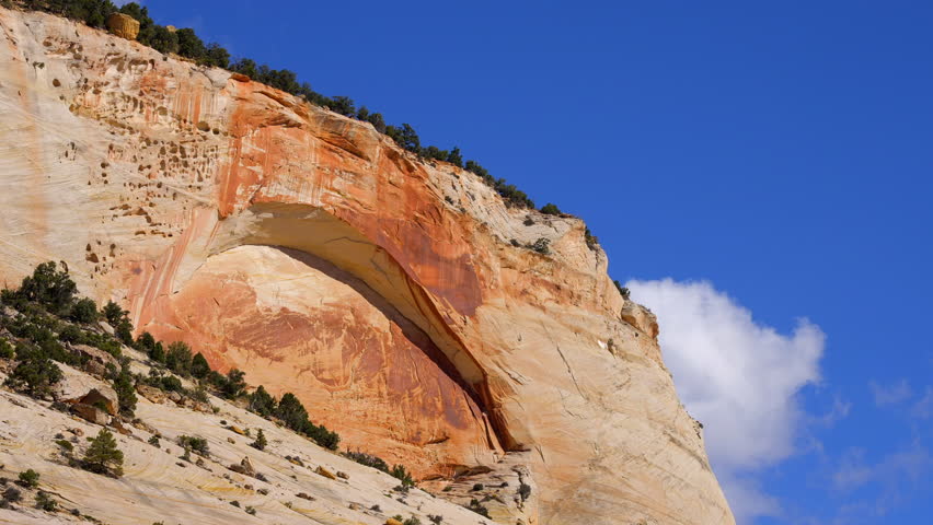 Establishing shot of mountains with red rocks in Zion Mount Carmel Highway, Zion National Park, Utah, North America. Day time. ProRes 422 HQ.