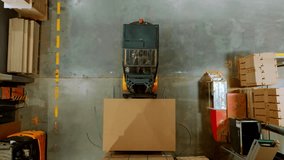 Top view of warehouse worker driving forklift. Warehouse worker preparing products for shipmennt, delivery, checking stock in warehouse. - Powered by Shutterstock - Get 15% off with code: PIKWIZARD15