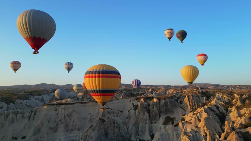  Hot air balloons in Cappadocia. Cappadocia is an amazing and spectacular landscape that has been sculpted by erosion over thousands of years. Royalty-Free Stock Footage #3411894021