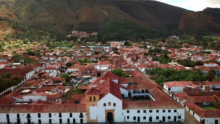 Villa de Leyva, colonial town known for Plaza Mayor, largest stone-paved square in South America, cobblestone streets, whitewashed buildings and historical UNESCO architecture. Boyaca, Colombia. Royalty-Free Stock Footage #3412002279
