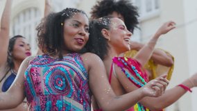 Carnival Joy in Brazil: Women Dancing with Delight at Street Festivity, Colorful Attire and Happy Faces in Brazilian Celebration. - Powered by Shutterstock - Get 15% off with code: PIKWIZARD15