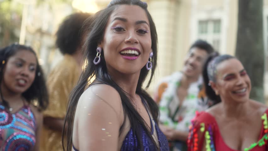 Exuberant Brazilian Carnival, Woman Reveling in Dance as Confetti Falls, Joyous Street Celebration with Friends Royalty-Free Stock Footage #3412127391
